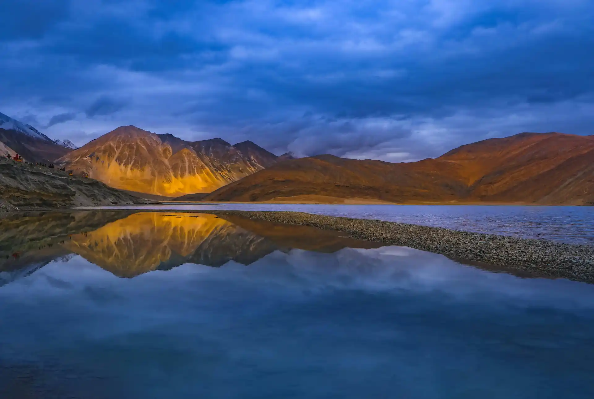 Sunrise colours reflecting over Pangong Lake on the 5-day Ladakh trip itinerary
